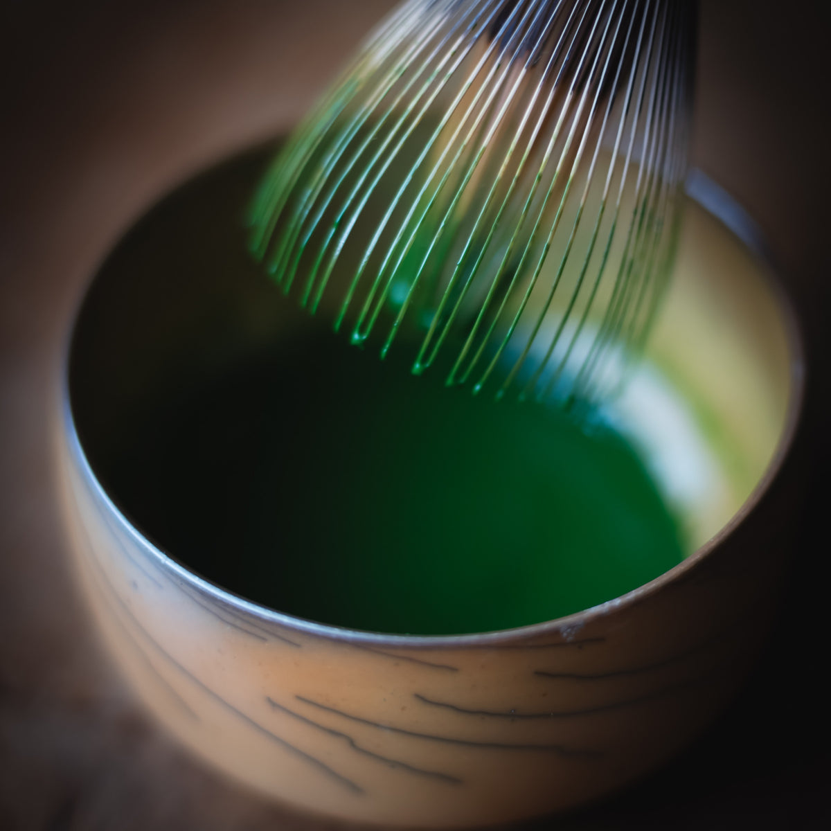 Chiyomukashi Matcha, bamboo whisk in the wood-glazed bowl