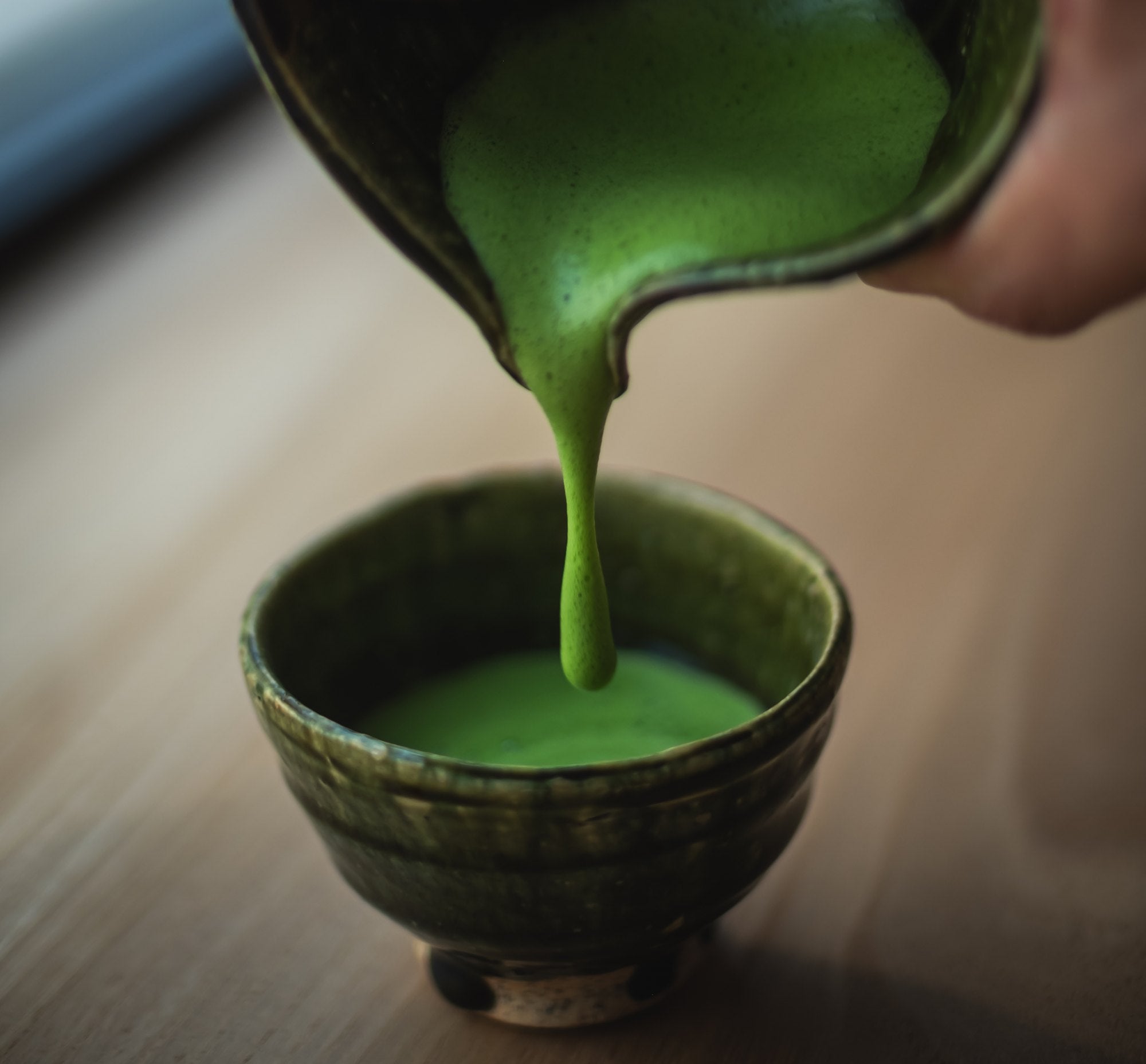 Vivid stone-milled Matcha whisked to a fine foam — UNEARTHED Gallery München