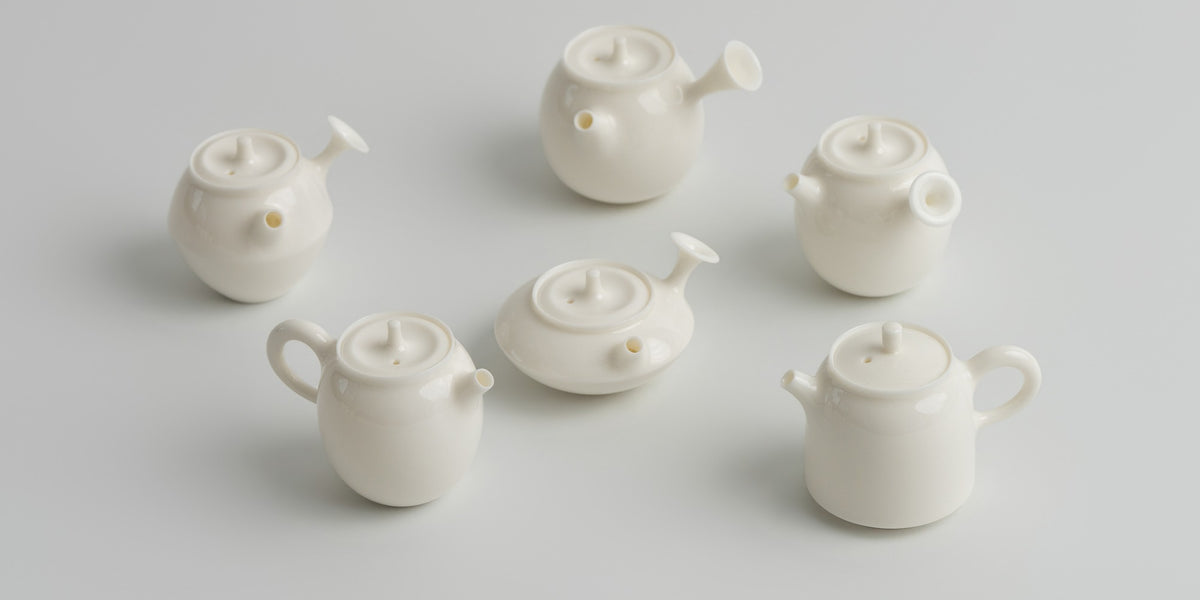 Six porcelain teapots by Buchangqi Studio, Dehua