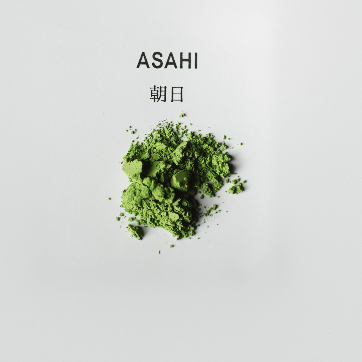 Asahi Matcha, powder heap on white paper