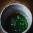 Asahi Matcha, hot water poured over the powder in the grey cup