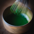 Chiyomukashi Matcha, bamboo whisk in the wood-glazed bowl