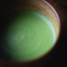 Chiyomukashi Matcha, close-up of the usucha foam in the wood-glazed bowl