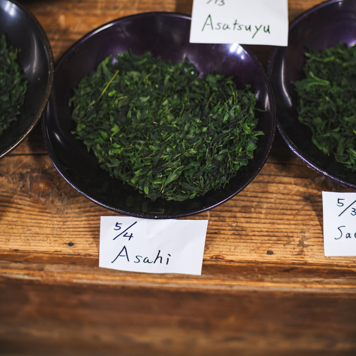 Chiyomukashi Matcha, bowls of tencha labelled by cultivar at the farm