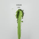 Choan Matcha, powder brushed into a stripe on white paper