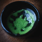 Choan Matcha, foam traces left in the black glazed bowl