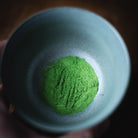 Okumidori Matcha, powder sifted into a pale grey bowl