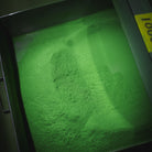 Okumidori Matcha, freshly stone-milled matcha in the collecting tray at the farm